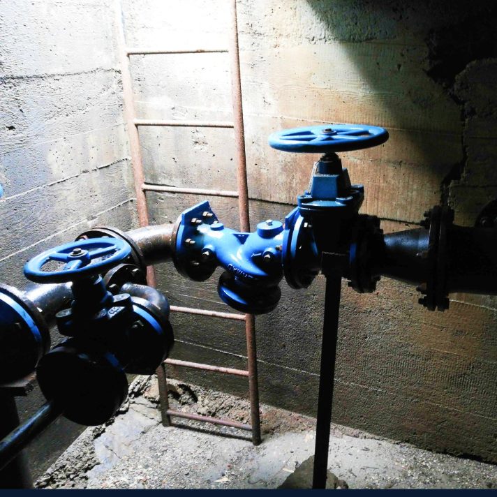 Water utility valves in a distribution chamber